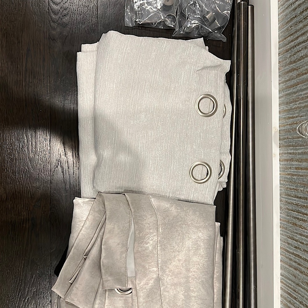 Two sets of grey curtains